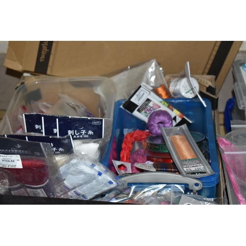 512 - FIVE BOXES OF ARTS AND CRAFTS SUPPLIES to include a large quantity of threads, string, and glitter, ... 