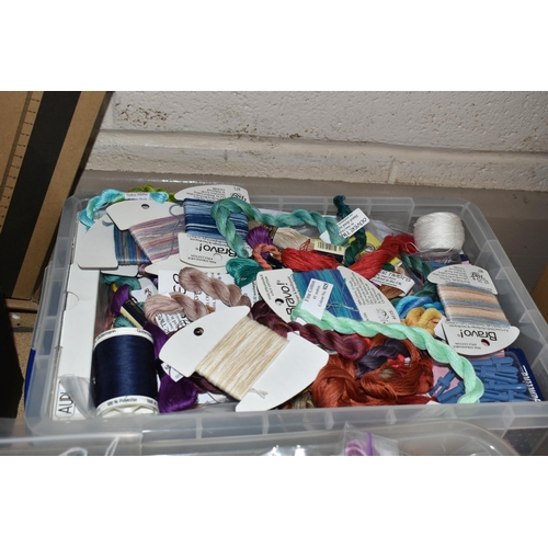 512 - FIVE BOXES OF ARTS AND CRAFTS SUPPLIES to include a large quantity of threads, string, and glitter, ... 