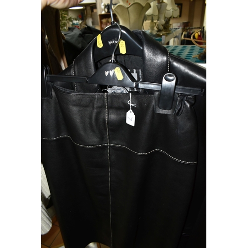 601 - A GROUP OF EIGHT LADIES JACKETS AND LEATHER SUIT, comprising a Dolce & Gabbana black belted trench c... 