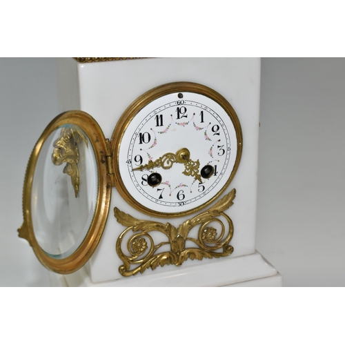 316 - AN ALABASTER AND GILT METAL CLOCK GARNITURE, the central clock flanked by two urns, case surmounted ... 