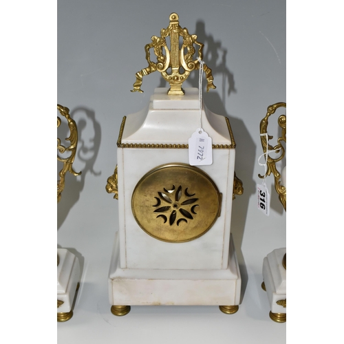 316 - AN ALABASTER AND GILT METAL CLOCK GARNITURE, the central clock flanked by two urns, case surmounted ... 