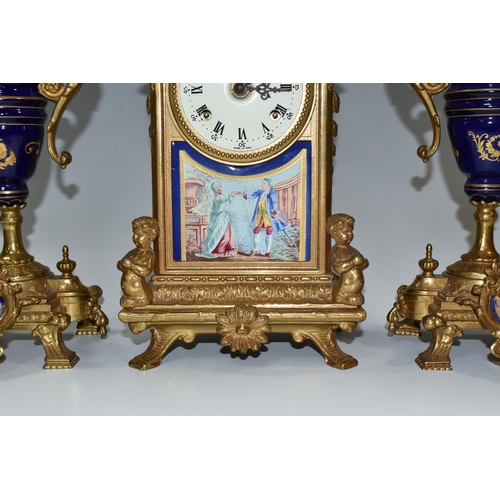 317 - AN ITALIAN CLOCK GARNITURE, gilt metal and ceramic, the garniture faux covered vases, all pieces dec... 