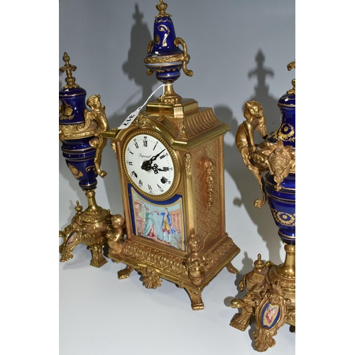 317 - AN ITALIAN CLOCK GARNITURE, gilt metal and ceramic, the garniture faux covered vases, all pieces dec... 