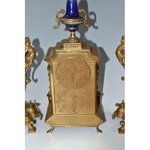 317 - AN ITALIAN CLOCK GARNITURE, gilt metal and ceramic, the garniture faux covered vases, all pieces dec... 