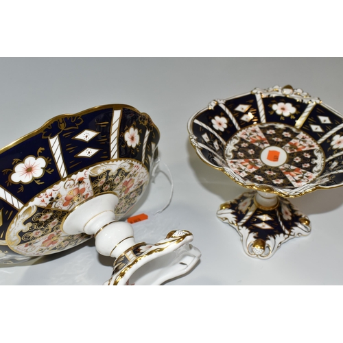 320 - TWO ROYAL CROWN DERBY IMARI 2451 COMPORTS, with twin handles in the forms of acorns, red printed bac... 