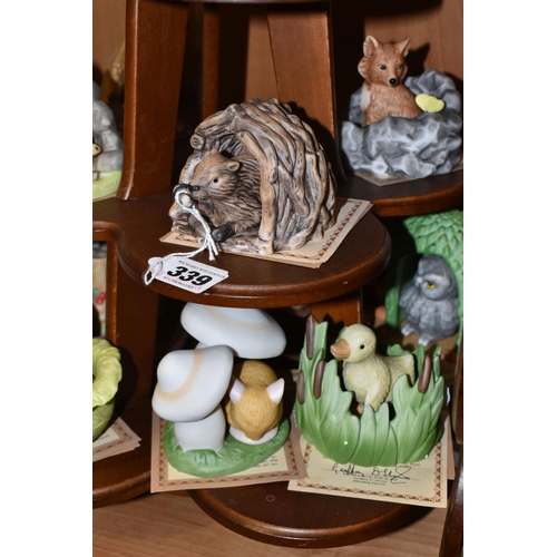 339 - A GROUP OF BOXED FRANKLIN PORCELAIN 'WOODLAND SURPRISES' FIGURES WITH DISPLAY STAND, each piece incl... 