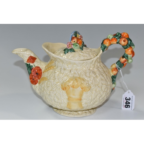 346 - A CLARICE CLIFF 'CELTIC HARVEST' TEAPOT, moulded and painted with fruits and wheatsheaves on a textu... 