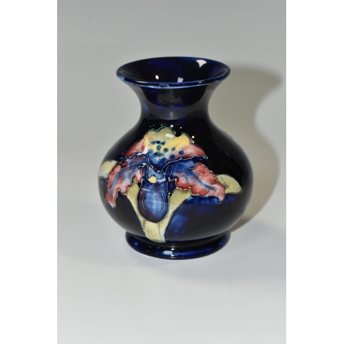 349 - A MOORCROFT POTTERY SMALL 'ORCHID' PATTERN VASE, of baluster form, tube lined with red, purple, blue... 