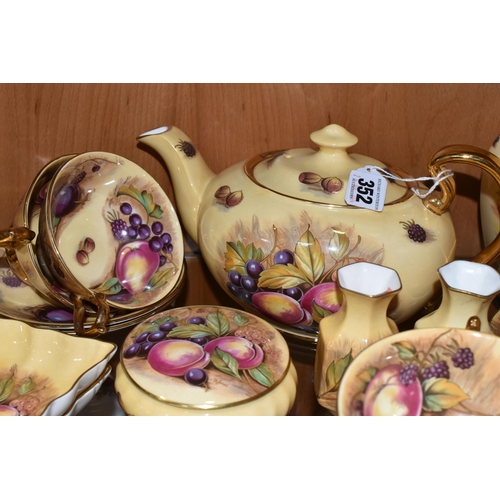 352 - A COLLECTION OF AYNSLEY 'ORCHARD GOLD' PATTERN TEA AND GIFTWARE, comprising an oval  teapot  with pr... 