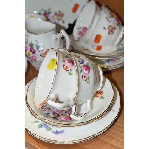 355 - A GROUP OF COALPORT 'JUNETIME' PATTERN TEAWARE, comprising a cake plate, milk jug, sugar bowl, six c... 