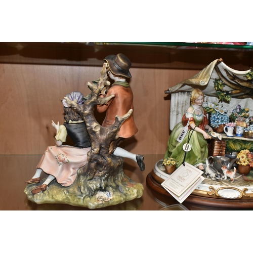 358 - TWO CAPODIMONTE PORCELAIN FIGURE GROUPS, comprising 'The Flower Seller' with original shop label and... 