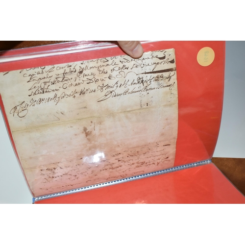 542 - SEVEN ALBUMS containing approximately 70 Letters and Legal Documents dating from 1610 - 1799, exampl... 