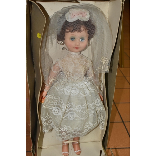 555 - TWO BOXES AND LOOSE VINTAGE DOLLS AND TOYS to include a large boxed Rosebud teenage doll, a boxed Ro... 