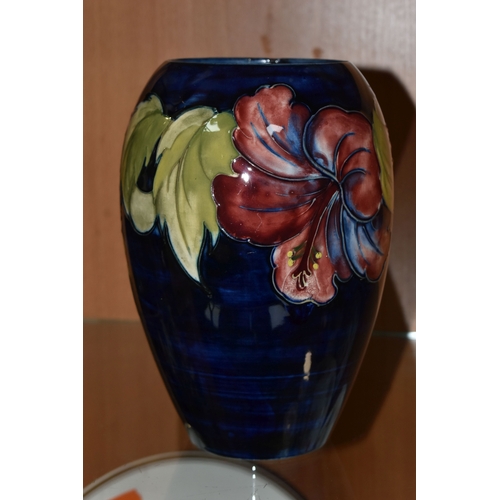 372 - A MOORCROFT POTTERY 'HIBISCUS' PATTERN VASE, of ovoid form, tube lined with red, purple and yellow h... 