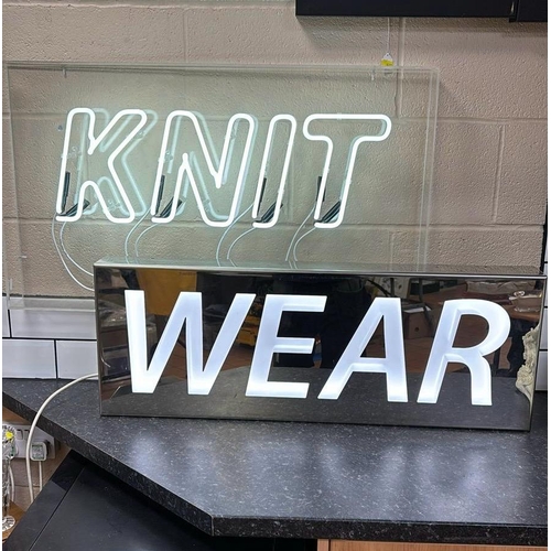 435 - A KNIT WEAR NEON SIGN, a Knit Wear Neon Sign set in Perspex and metal frame, height 72cm x length 11... 