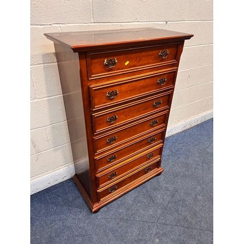 1247 - A REPRODUCTION MAHOGANY SERPENTINE SIDEBOARD, with a raised back, two drawers, flanked by two cupboa... 