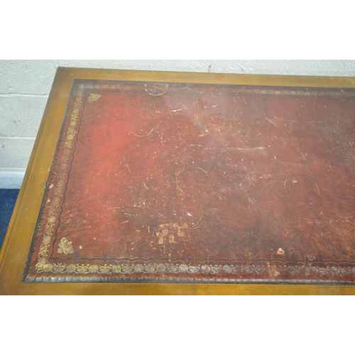 1204 - A 20TH CENTURY MAHOGANY TWIN PEDESTAL DINING TABLE, with a burgundy leather writing surface, fitted ... 