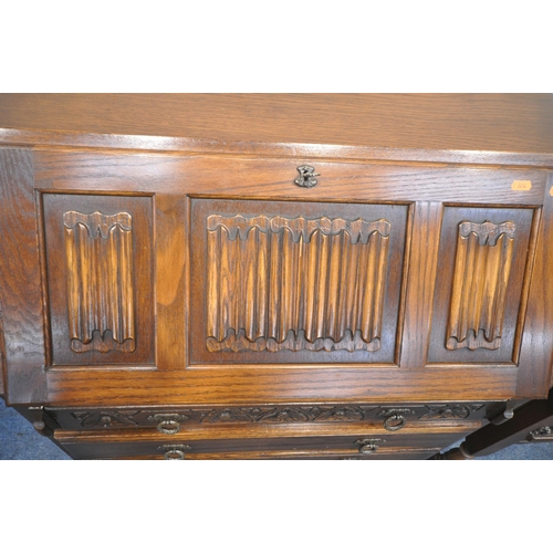 1215 - TWO PIECES OF OAK OLD CHARM FURNITURE, to include a bureau, the fall front door enclosing a fitted i... 