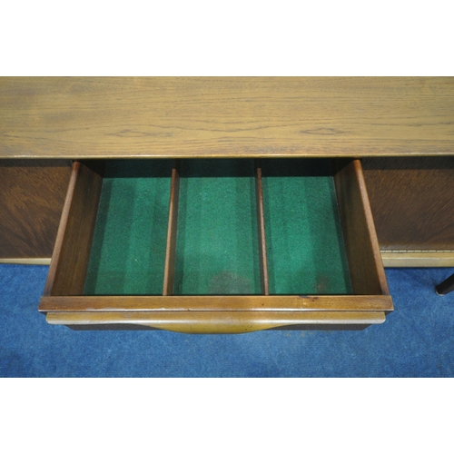 1217 - POSSIBLY JENTIQUE, A MID CENTURY TEAK SIDEBOARD, fitted with three drawers, two cupboard doors and a... 