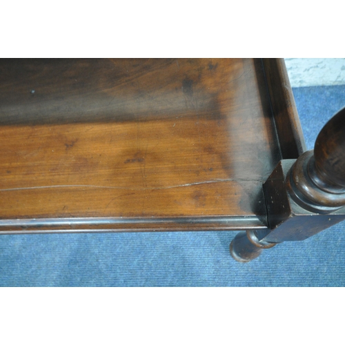 1219 - AN EDWARDIAN MAHOGANY TWO TIER BUFFET, each corner with finials, raised on turned supports, width 12... 