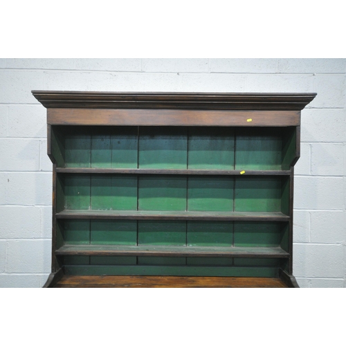 1223 - A VICTORIAN PINE DRESSER, the three tier plate rack, atop a base that's fitted with three drawers, t... 