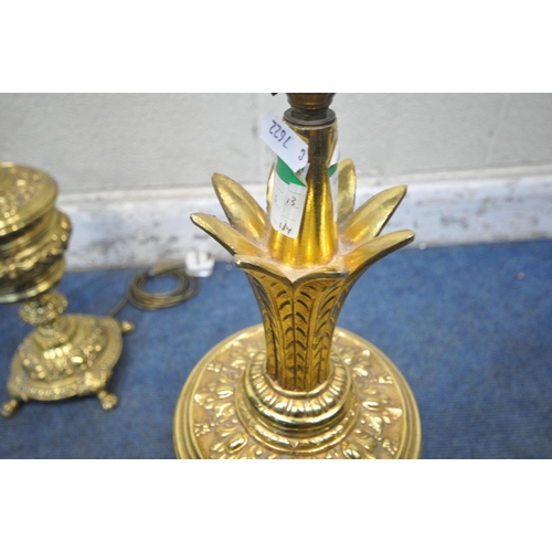 1235 - A PAIR OF BULBOUS BRASS TABLE LAMPS, with intricate details, raised on four paw feet, height to fitt... 