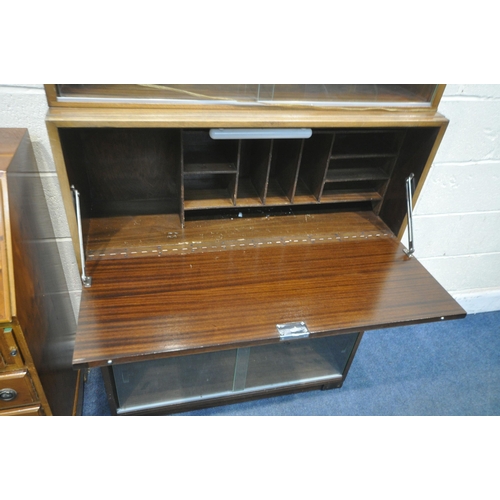 1254 - A 20TH CENTURY MINTY NEO-CRAFT DESIGN BOOKCASE, fitted with six glazed double sliding doors, and a f... 