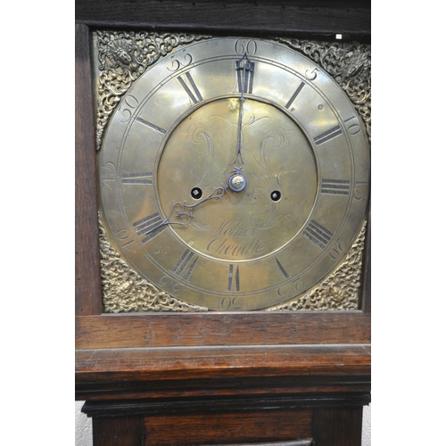 1257 - A GEORGIAN OAK EIGHT DAY LONGCASE CLOCK, the square glass door enclosing an 11 inch brass dial, depi... 