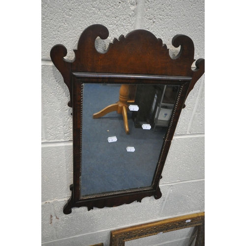 1294 - A SMALL 19TH CENTURY MAHOGANY FRETWORK WALL MIRROR, 37cm x 61cm, along with four sized gilt frames (... 