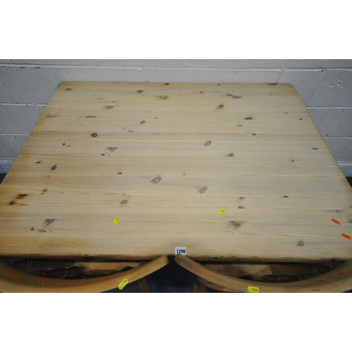 1296 - A PINE RECTANGULAR KITCHEN TABLE, raised on block and turned legs, length 122cm x depth 92cm x heigh... 