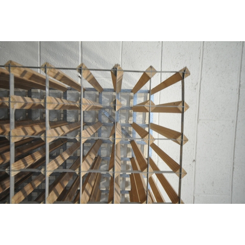 1304 - A LARGE WOOD AND METAL WINE RACK, with 220 sections, width 108cm x depth 54cm x height 193cm (condit... 