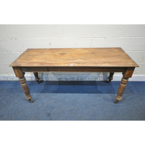 1305 - AN EDWARDIAN MAHOGANY RECTANGULAR TABLE, raised on turned legs and ceramic castors, length 153cm x d... 