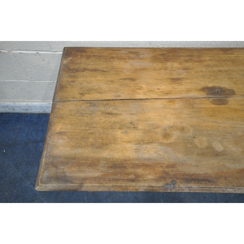 1305 - AN EDWARDIAN MAHOGANY RECTANGULAR TABLE, raised on turned legs and ceramic castors, length 153cm x d... 