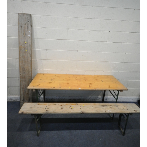 1306 - A PINE TOP RECTANGULAR TABLE, with folding metal legs, length 179cm x depth 67cm x height 74cm, alon... 