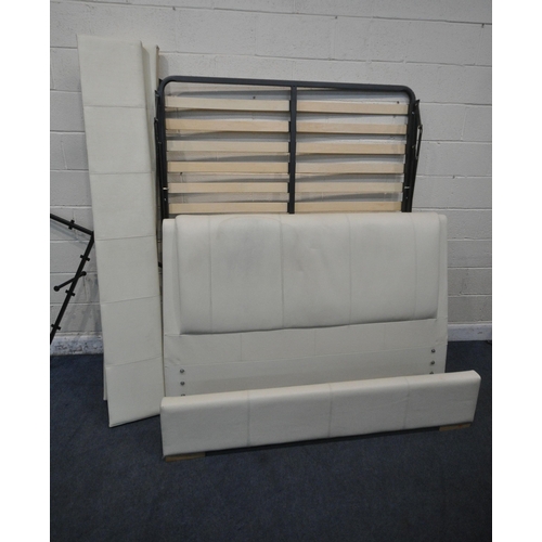 1314 - A CREAM LEATHER 5FT BEDSTEAD, the slats with a hinged mechanism (condition report: stains, discolour... 