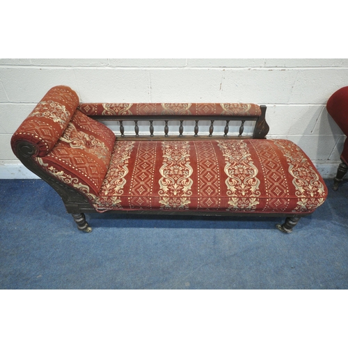 1316 - TWO EDWARDIAN MAHOGANY CHAISE LOUNGES, one with plain red upholstery, the other with patterned uphol... 