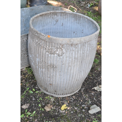 1008 - VINTAGE GALVANISED ITEMS comprising of a tin bath, a dolly tub and peg and a milking stool (4)