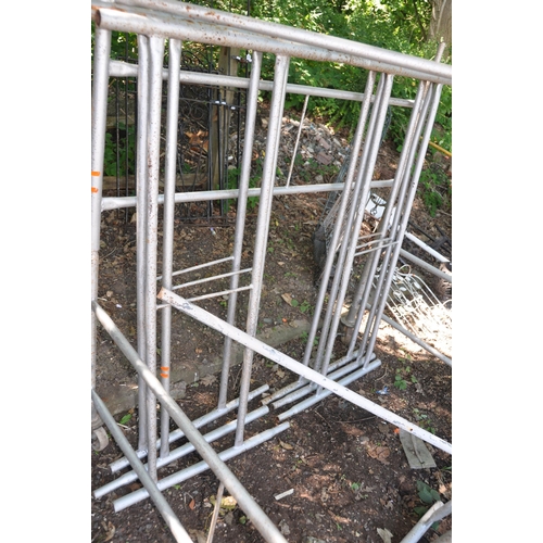 1010 - A TUBULAR STEEL SCAFFOLDING TOWER width and depth 136cm unknown height but has fifteen panels (two p... 