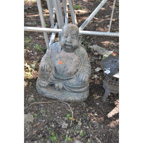 1013 - THREE MODERN ORIENTAL STYLE GARDEN ORNAMENTS including a modern composite Pagoda height 60cm, a Budd... 