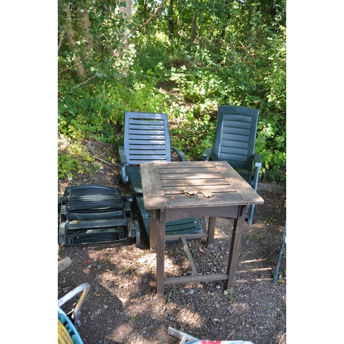 1019 - A SELECTION OF GARDEN FURNITURE including two Green plastic sun loungers and one folding chair and a... 