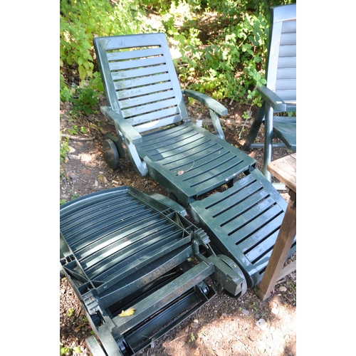 1019 - A SELECTION OF GARDEN FURNITURE including two Green plastic sun loungers and one folding chair and a... 