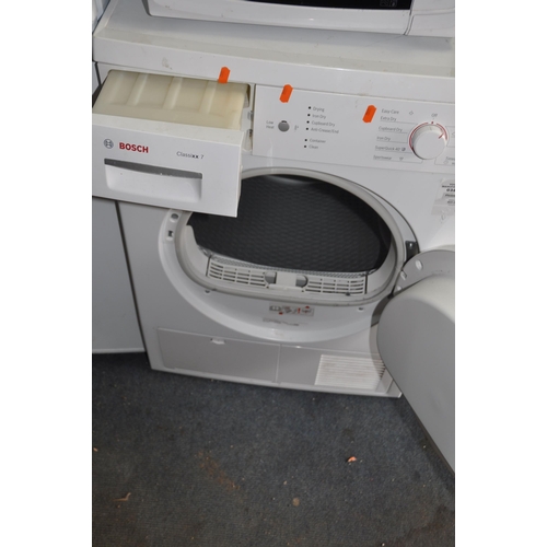 1051 - A BOSCH WTE84106GB CONDENSOR DRYER width 60cm depth 60cm height 85cm and a Cookworks microwave (both... 