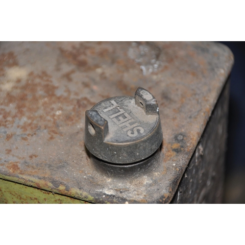 1059 - THREE VINTAGE FUEL CANS AND TWO OIL JUGS including a Shell jug and fuel can with brass Shell cap (ha... 