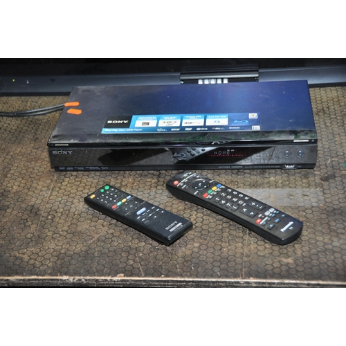 1079 - A PANASONIC TH-42PX70BA 42in TV WITH REMOTE (no stand but has wall bracket)and a Sony Blu-Ray player... 