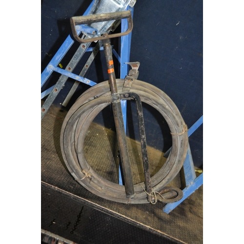 1081 - A PAIR OF VICRORIAN CAST IRON TRESTLE STANDS width 77cm height 73cm, a vintage stirrup pump and a pa... 