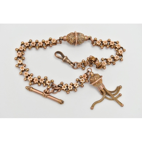 1 - A YELLOW METAL ALBERTINA, a fancy link chain with punched star detail to the links, fitted with a fl... 