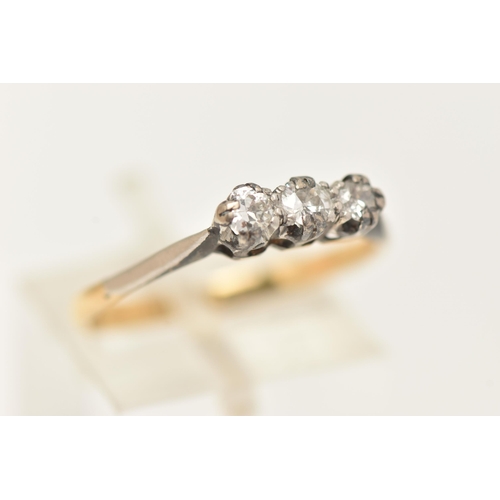 25 - A THREE STONE DIAMOND RING, designed as three brilliant cut diamonds in claw settings, stamped 18ct,... 