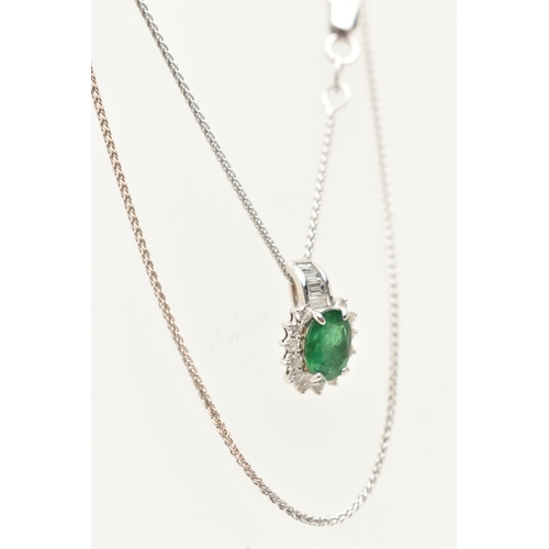 55 - A WHITE METAL EMERALD AND DIAMOND PENDANT WITH AND 18CT WHITE GOLD CHAIN, the oval cluster pendant s... 