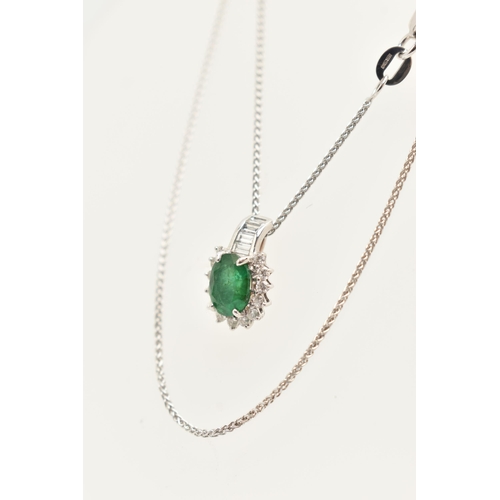 55 - A WHITE METAL EMERALD AND DIAMOND PENDANT WITH AND 18CT WHITE GOLD CHAIN, the oval cluster pendant s... 