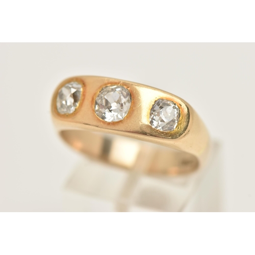 6 - A YELLOW METAL THREE STONE DIAMOND RING, three old mine cut diamonds, approximate total diamond weig... 